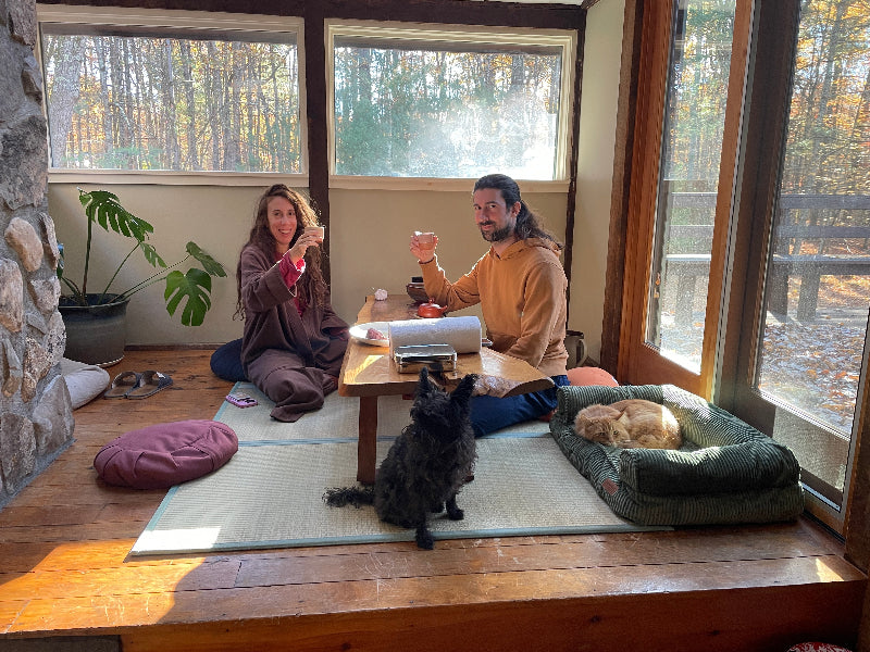 Diana and Patrick with their dogs at home in the Hudson Valley